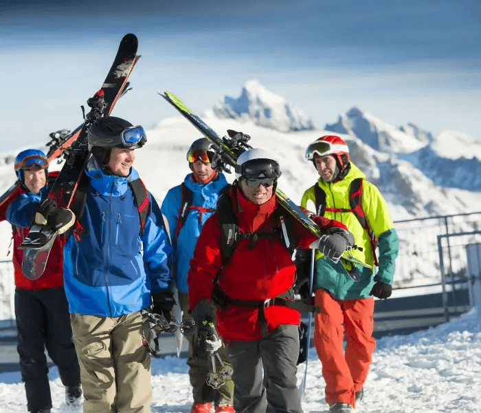 A group of skiers head to the chairlift at Hotel terra in Jackson Hole.