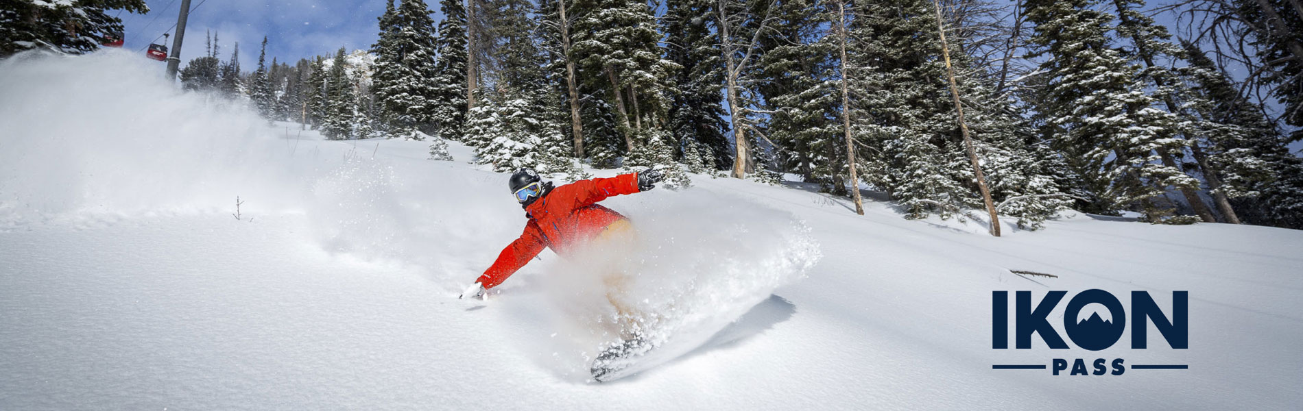 Snowboarder under the Jackson Hole tram.