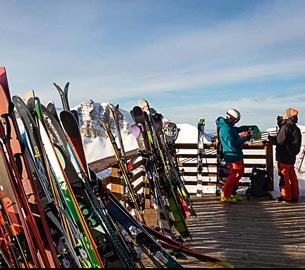 Skis up again a railing. Skis up again a railing.