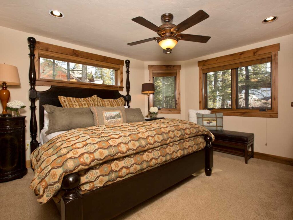 Blue Moose Lodge Guest Room With Many Windows.